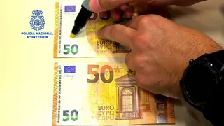 Billetes falsos. Foto de archivo