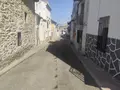 Uno de los astados en el recorrido del encierro por la localidad este martes 18 de agosto