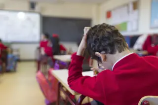 Niños en una clase. Foto de archivo EP