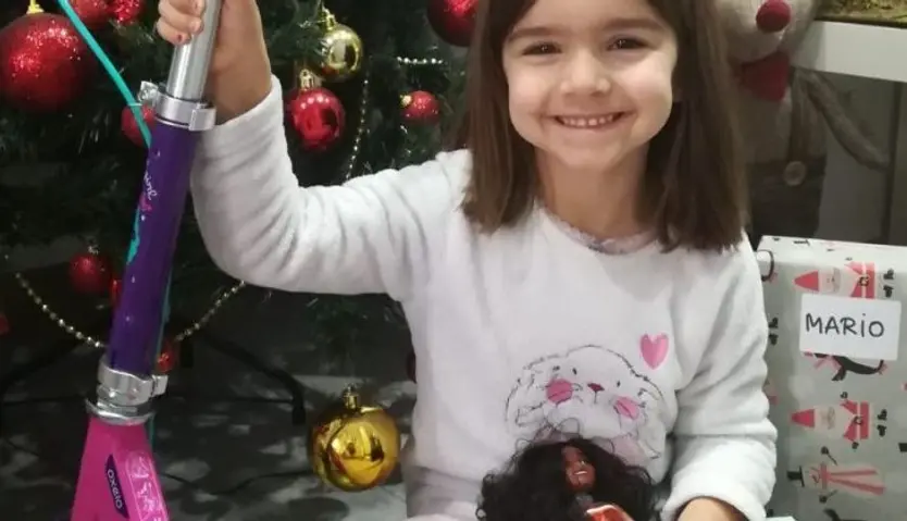 Maria y su patinete