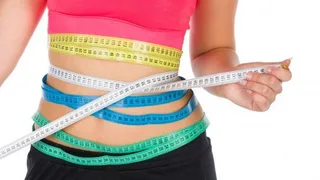 Fit woman with a tape 1515605090Pm4
