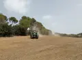 Imagen De Un Agricultor Con El Tractor En El Campo. Asaja