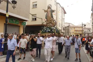 Procesión, ofrenda floral, baile y degustación en Guijuelo