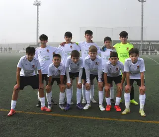 Adrián Ibarra (abajo a la izquierda) durante un partido con el Ciudad Rodrigo Club Fútbol | Imagen @CRCF_oficial